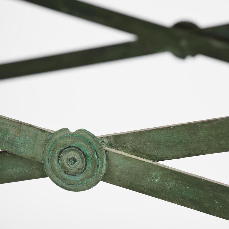 A table with Swedish 'Orrlok' porhyry top, early 19th century on a later bronze stand.