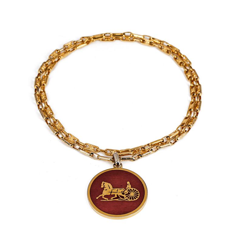CÉLINE, a necklace.