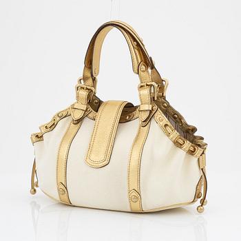 Louis Vuitton, a white canvas and gold 'Theda PM' bag, 2004.