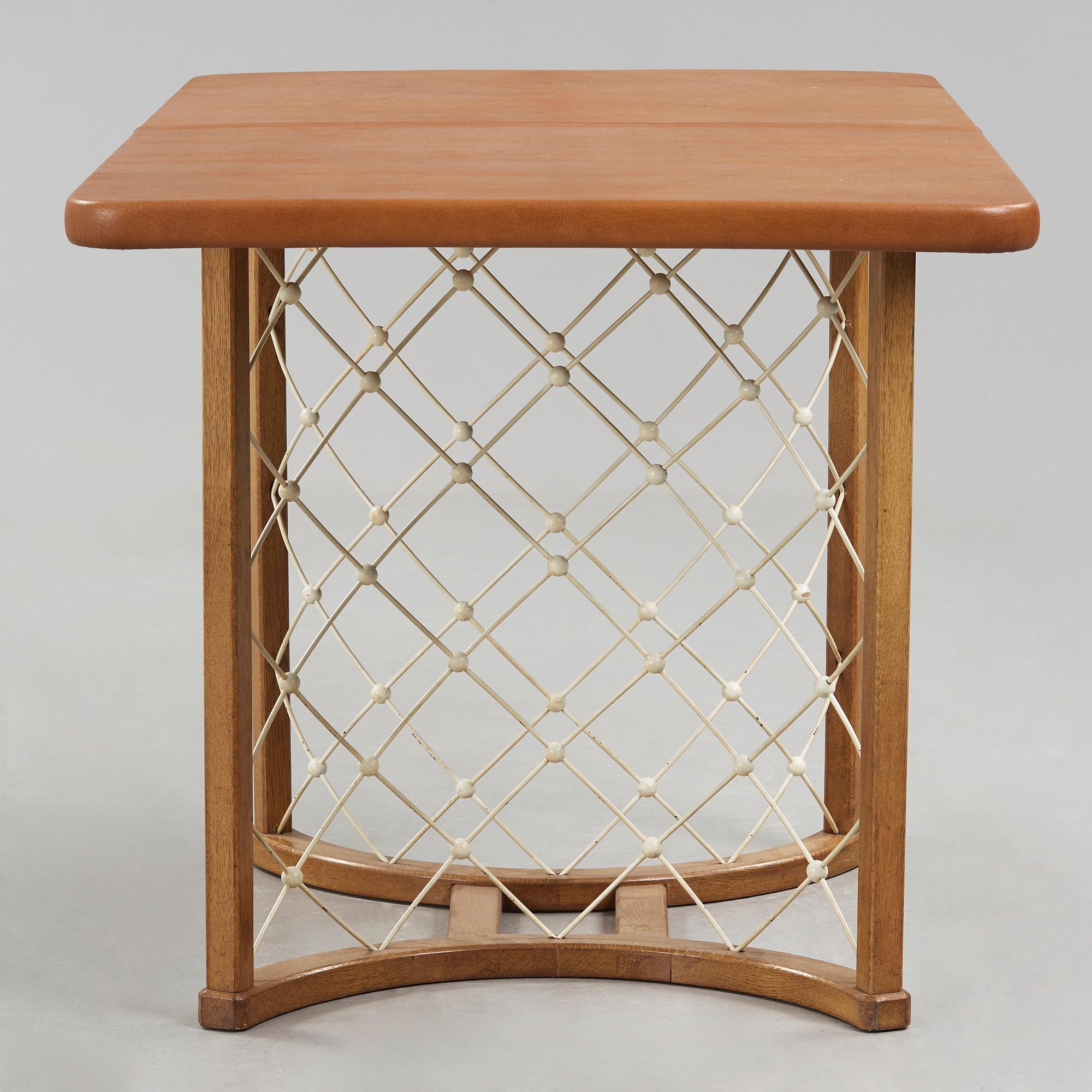 A modernist oak based table, 1940-50's.