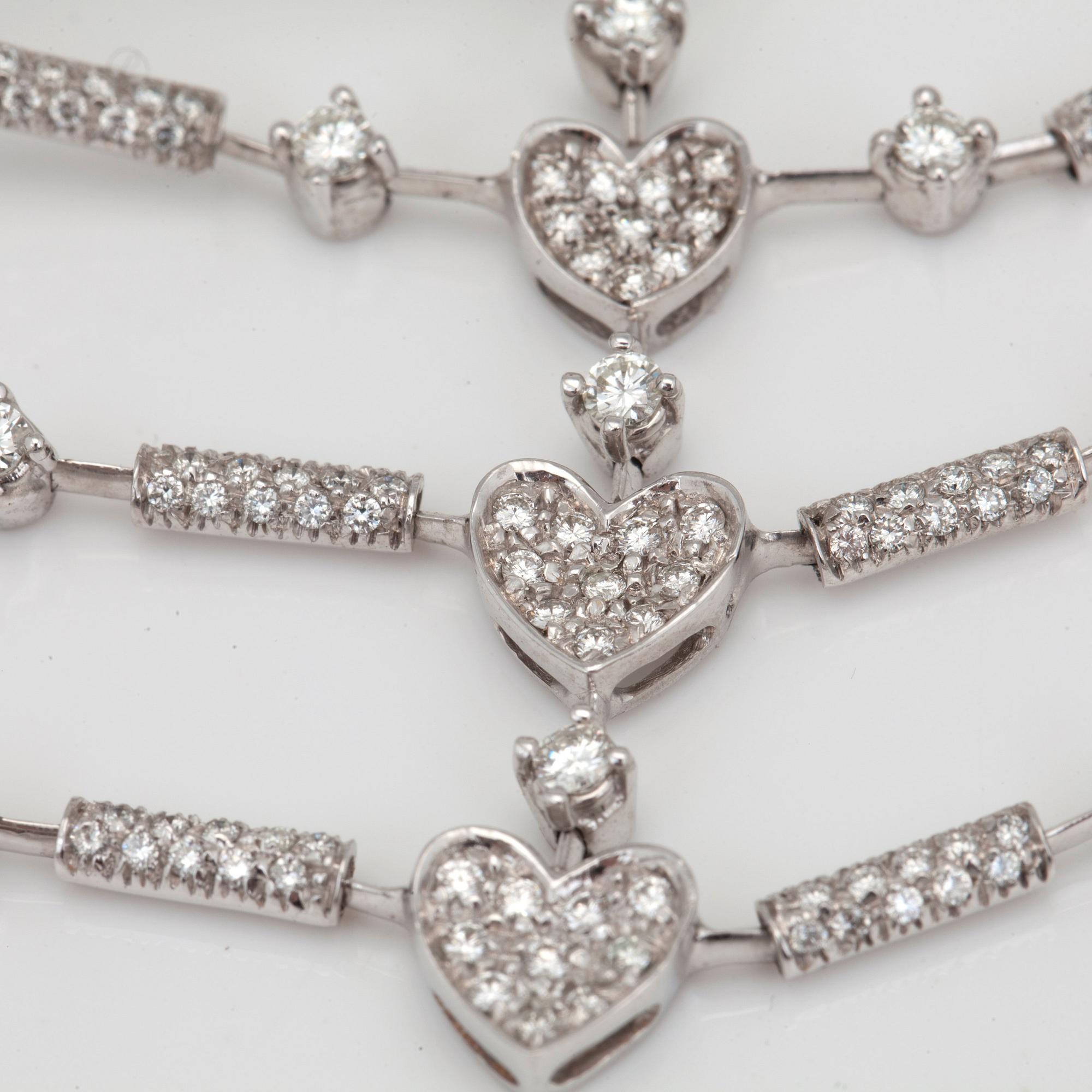 COLLIER, Stefan Hafner, med briljantslipade diamanter totalt ca 9.40ct.