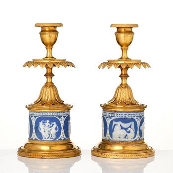 A pair of George III ormolu and jasperware candlesticks, late 18th century.