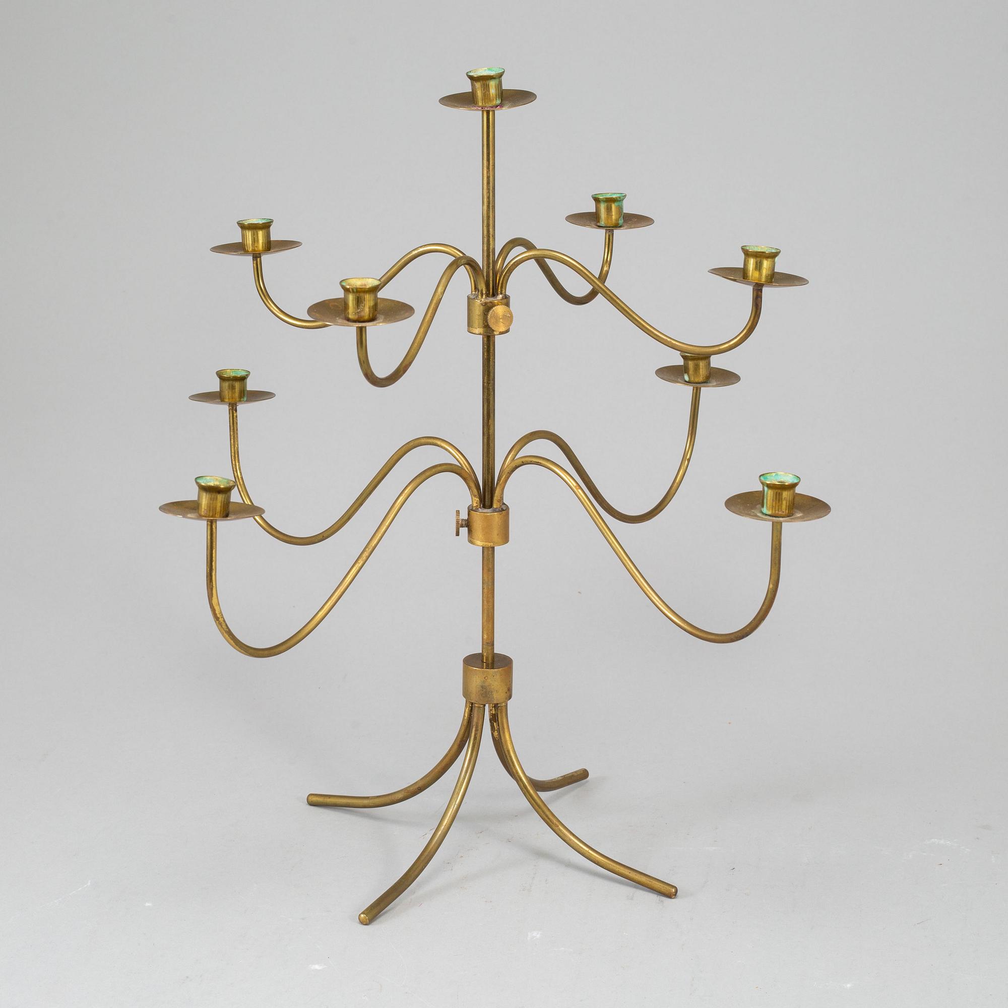 A BRASS CANDELABRUM, second half of the 20th century.