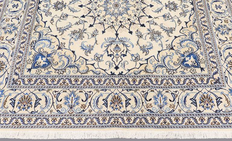 A rug, Nain part silk, ca 197 x 197 cm.
