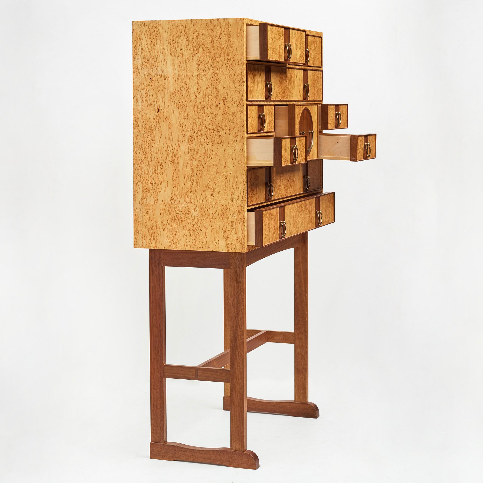 Josef Frank, a birch burrwood and padouck cabinet on stand, model 2215, Svenskt Tenn Sweden probably 1960-70's.