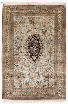 A Ghom, figural, silk rug, c. 205 x 140 cm.