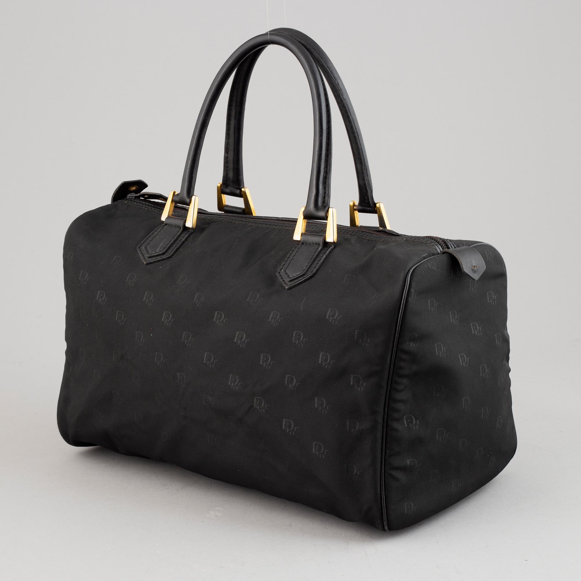 Christian Dior, a brack canvas 
'Speedy' handbag.