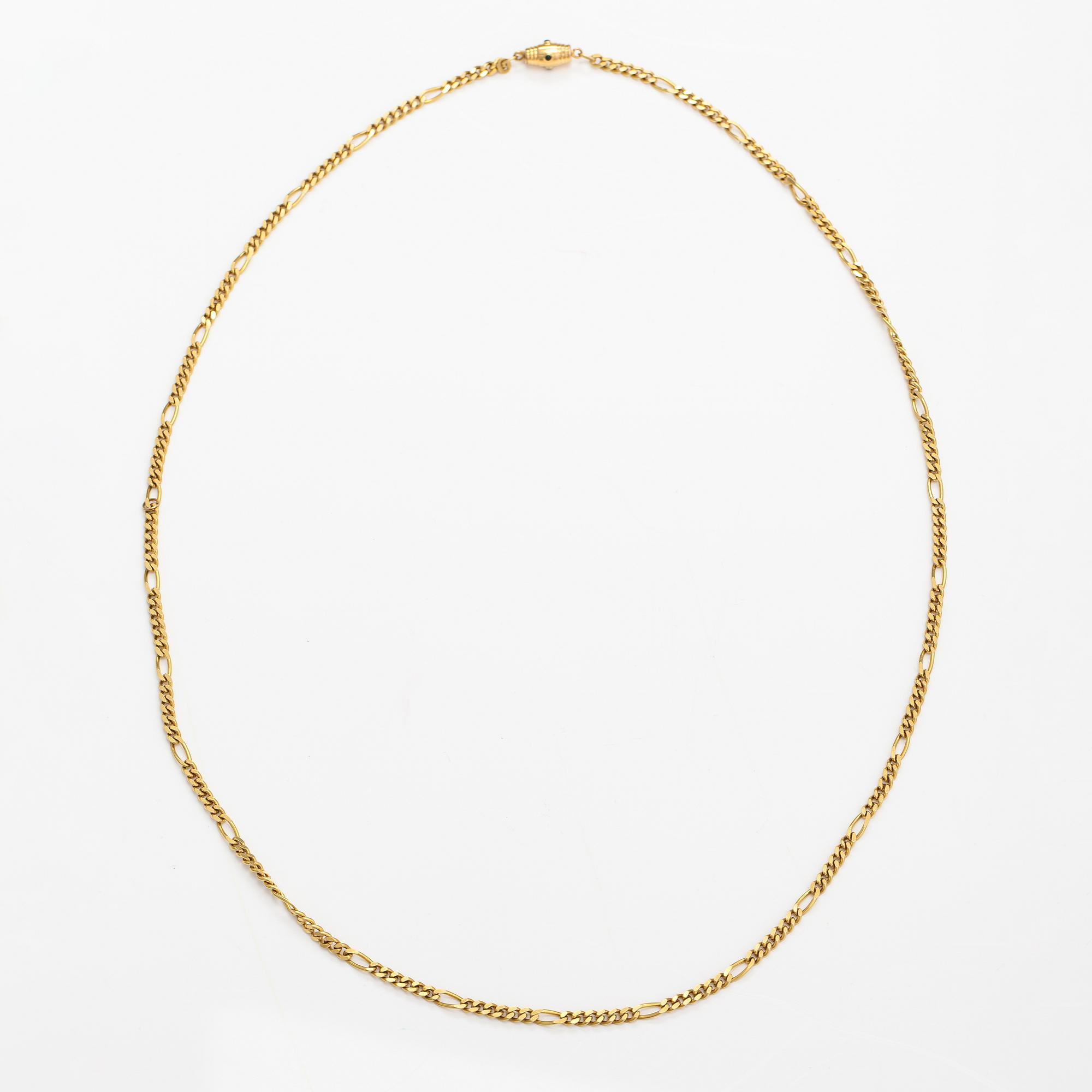 An 18K gold neckalce with stones. Erling Kaj Oy Ab, Helsinki 1977.