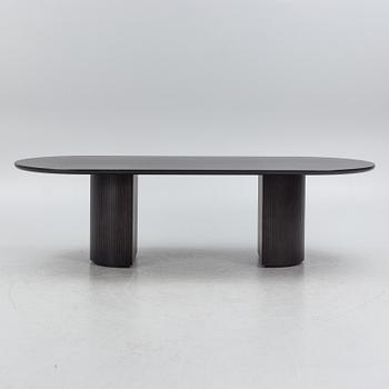 Space Copenhagen, a 'Moon' dining table, Gubi, Denmark.