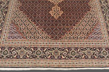 A CARPET, Tabriz part silk , so called 40 Radj, ca 298 x 202 cm.