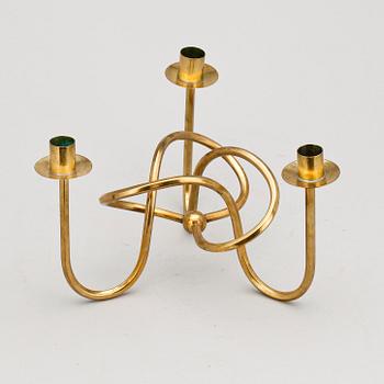 LJUSSTAKE, mässing, "Vänskapsknuten", Josef Frank, Firma Svenskt Tenn, formgiven 1938.