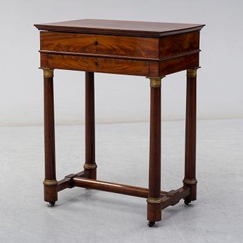 A mid 19th century sewing table.