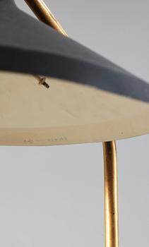 A Greta Magnusson Grossman 'G-10' black lacquered metal and brass floor lamp by Bergboms, Sweden 1950's.