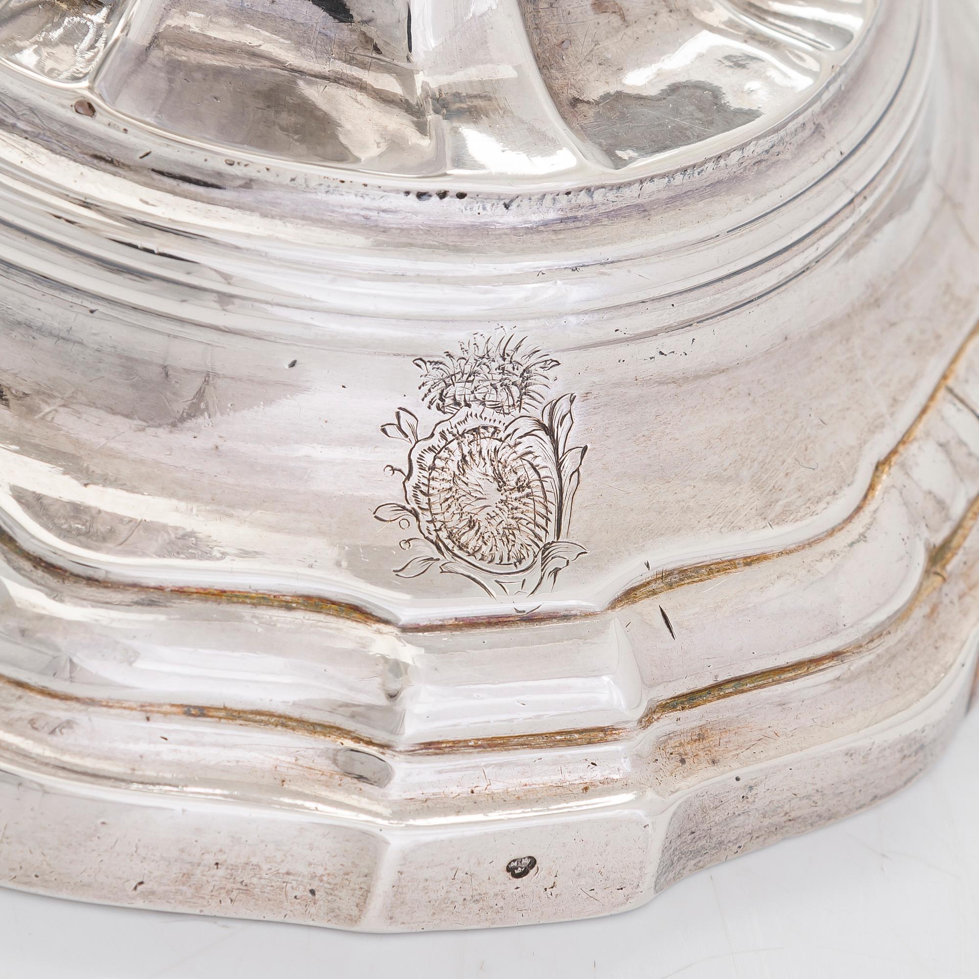 A pair of 18th-Centuty French silver candlesticks, maker's mark of Jean-Joseph Falguière (active in Dinan 1744-1773).