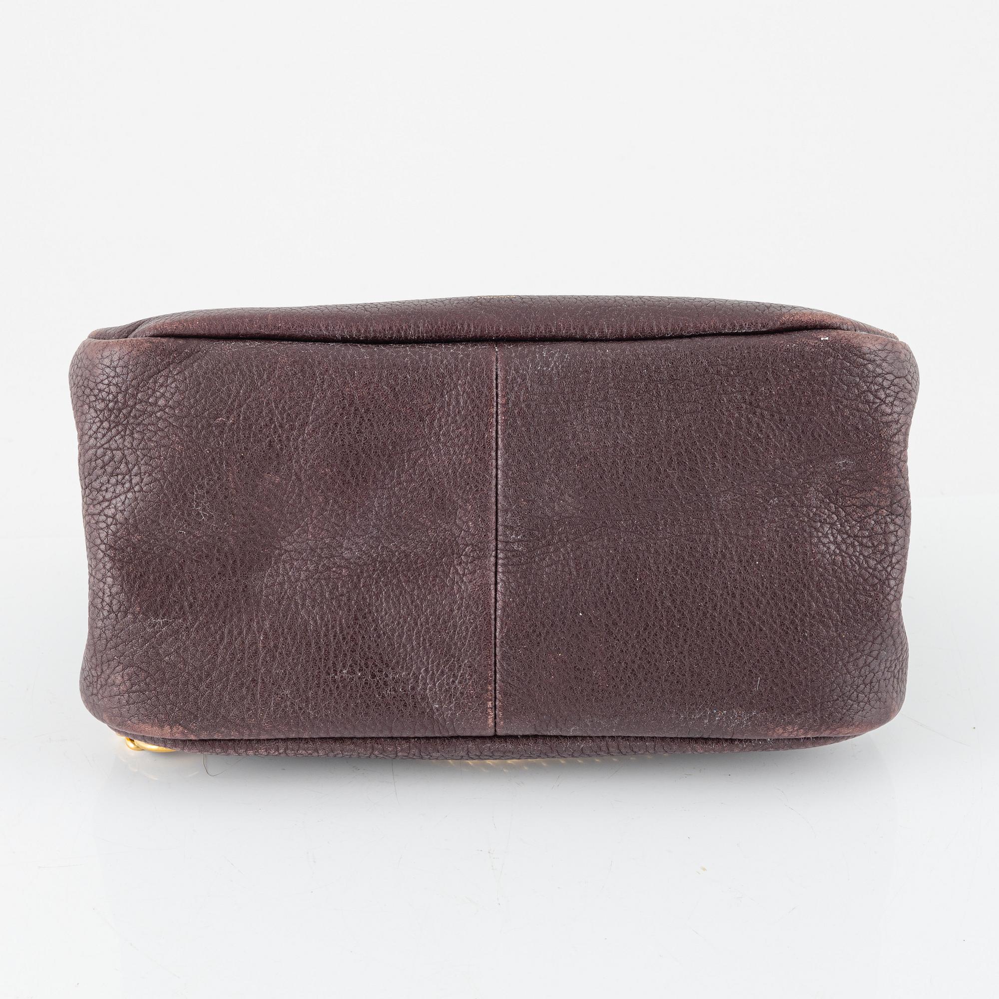 Mulberry, a burgundy leather handbag.