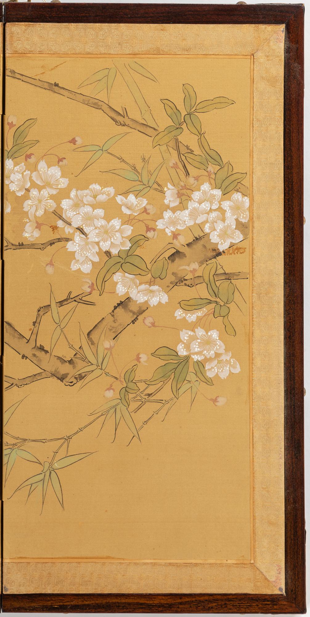 A Chinese folding screen, 20th century.