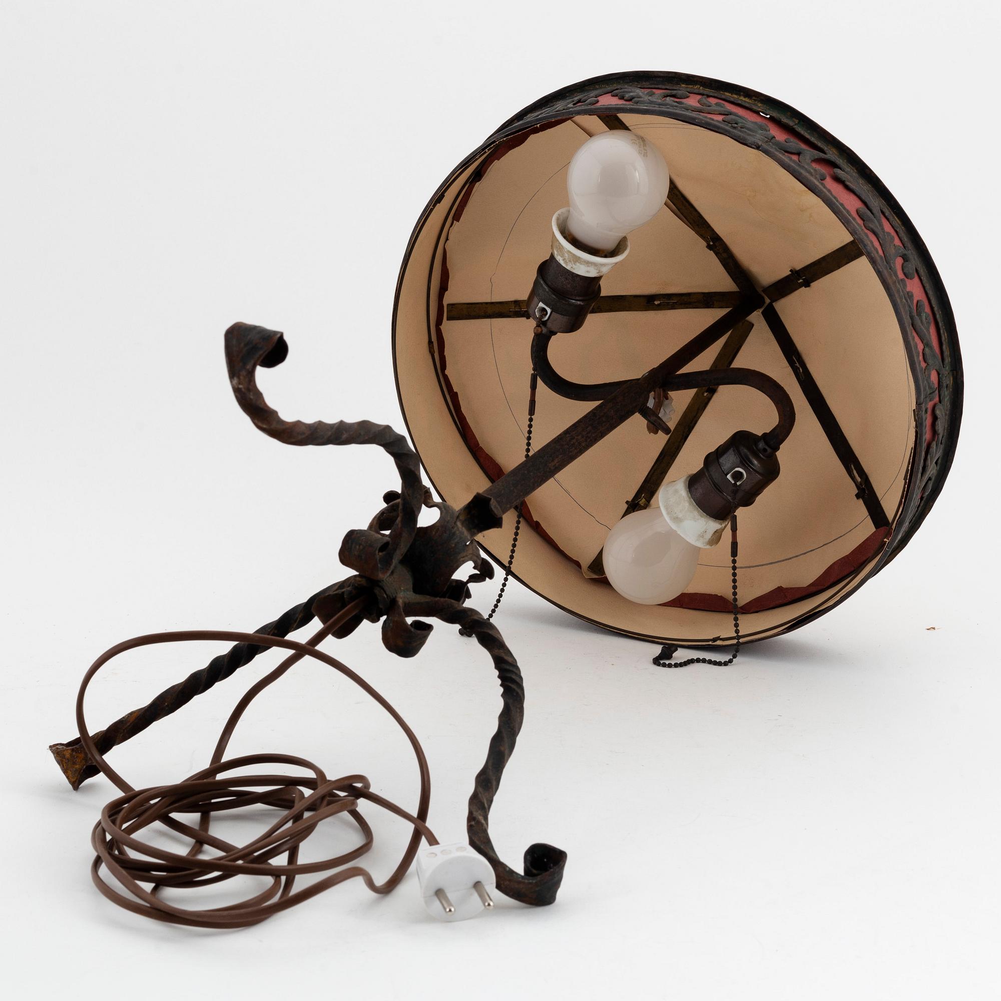 A wrought iron table light, 1920's.