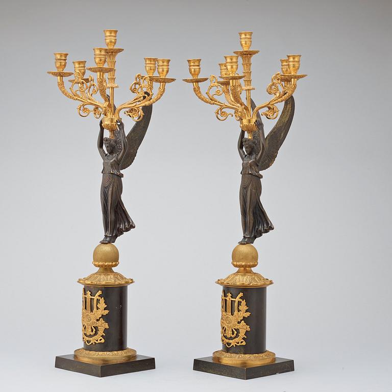A pair of Empire-style late 19th century six-light candelabra.