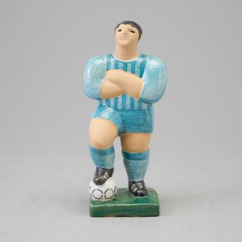 A Lisa Larson stoneware figure of a football player, Gustavsberg.