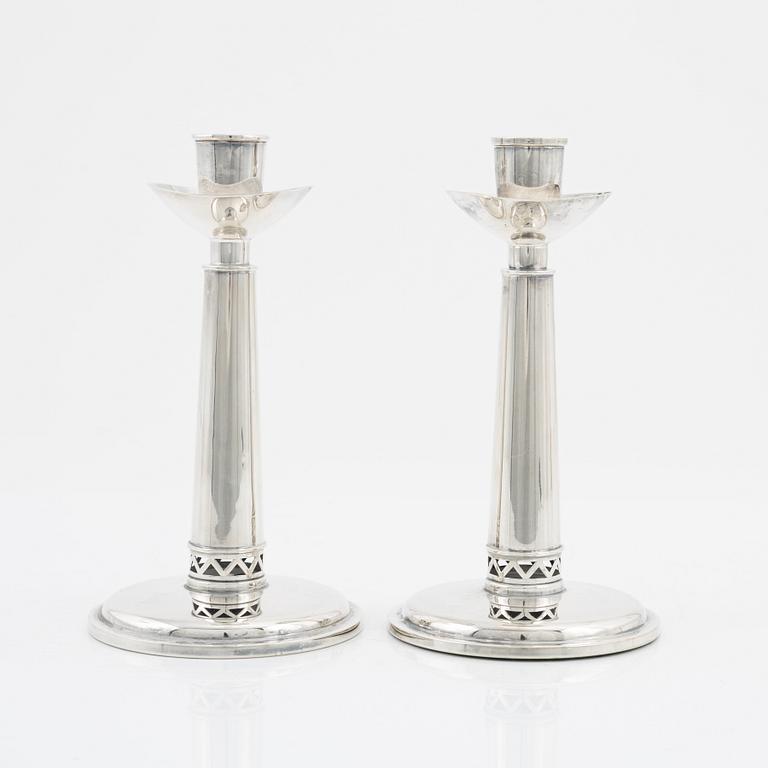 A pair of silver candle sticks, Tesi, 1960.