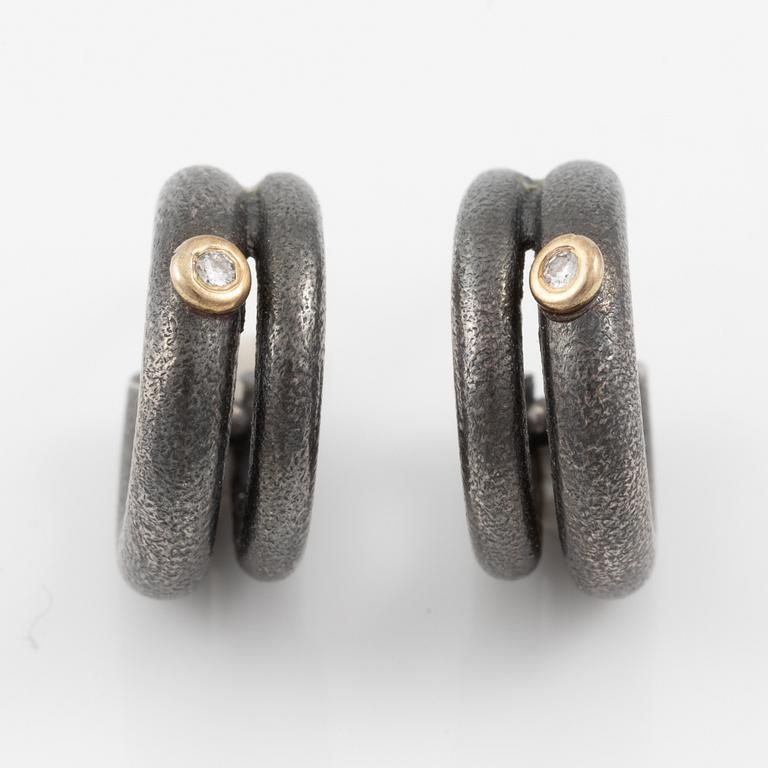 Bracelet, necklace, a pair of earrings, and a ring, Pia Rauff, silver with small diamonds.