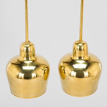 Paavo Tynell, a pair of mid 20th century ceiling lights, model 1699, for Taito / Idman.