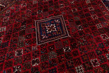 An oriental rug, c. 365 x 285 cm.
