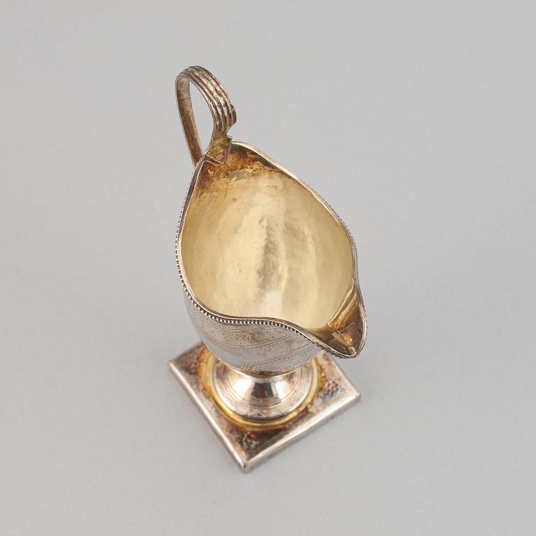 A silver creamer, indistinct makers mark, London, 1791.