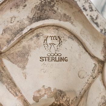 A five-piece sterling silver coffee and tea service, and 12 spoons, USA, first quarter of the 20th century.