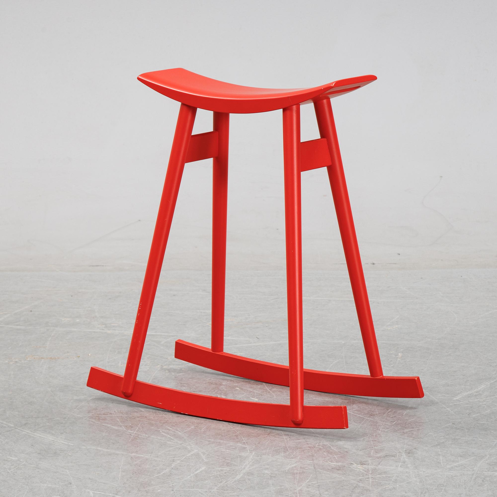 Per Sundstedt, a wood rocking stool from Pyra, Sweden.