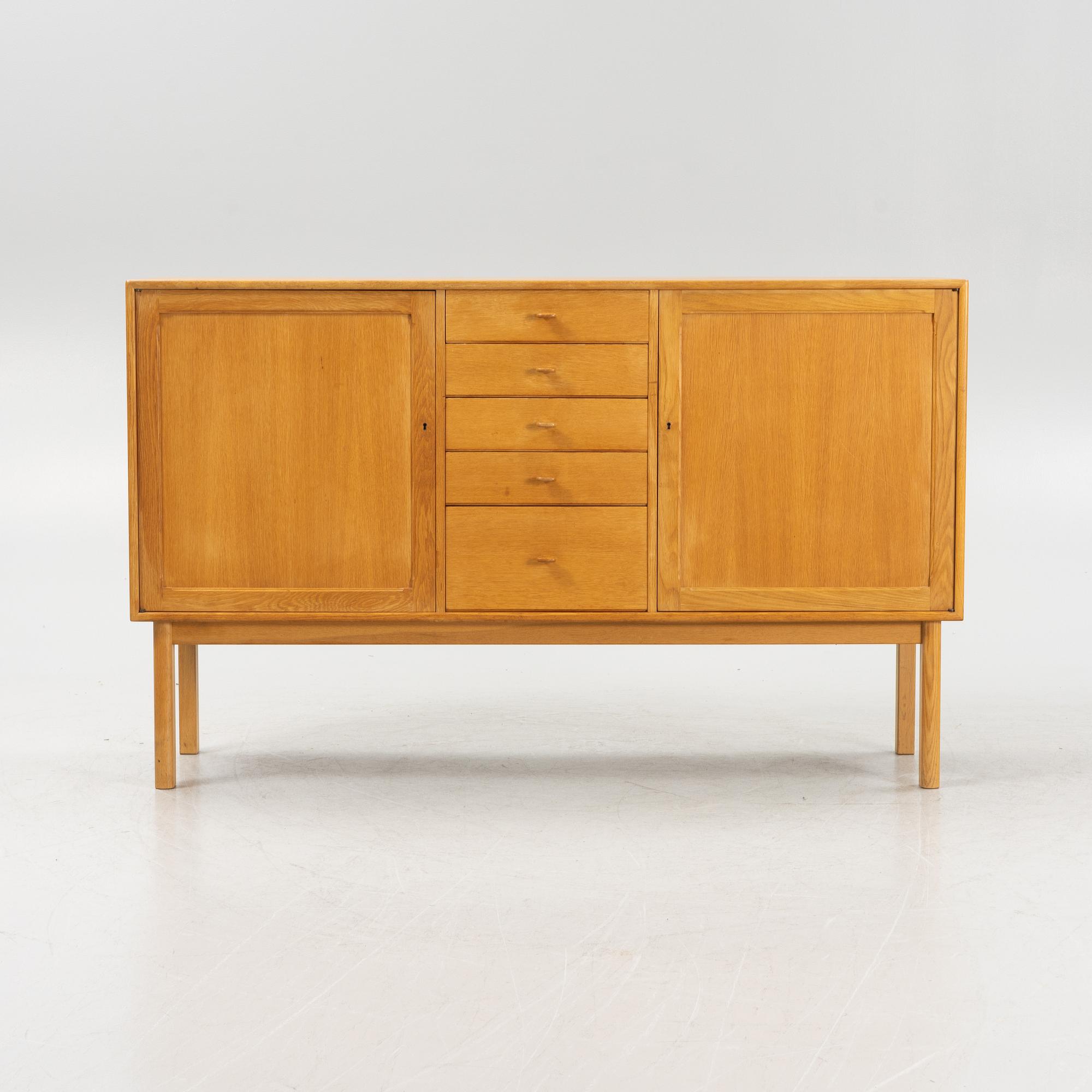 Sven Engström och Gunnar Myrstrand, an oak veneered sideboard, for Bodafors, dated 1962.