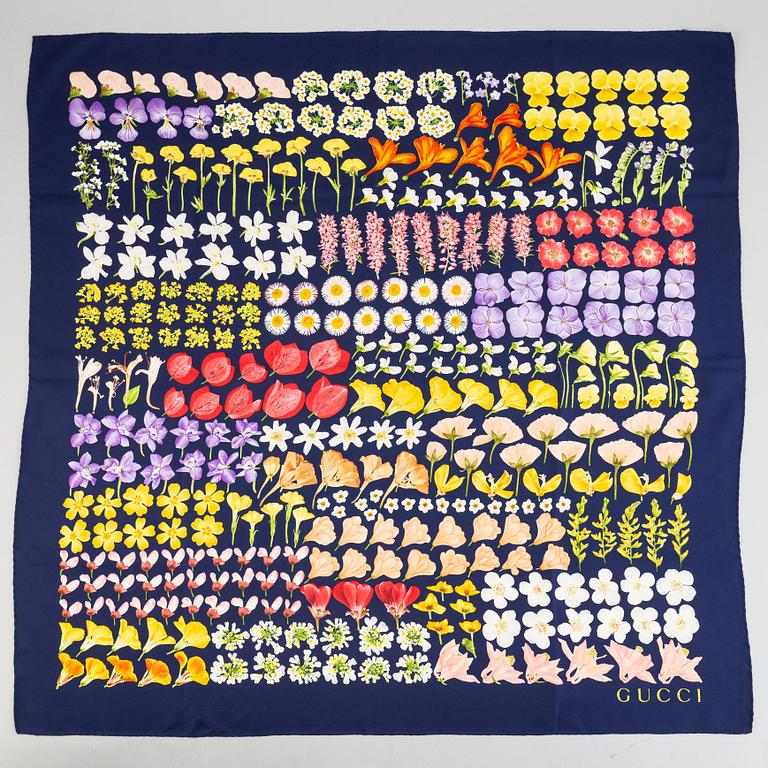 Gucci, a silk scarf.