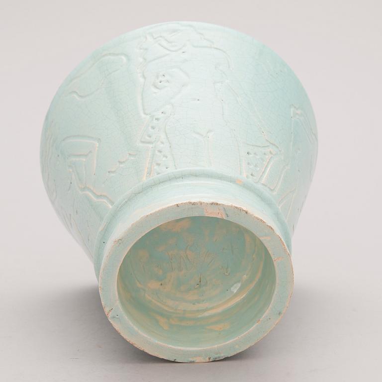 A glazed ceramic pot, signed and dated -34.