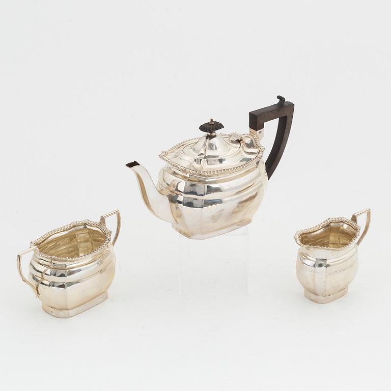 A three piece silver tea service, London 1918.