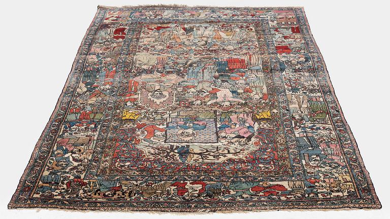 An antique Isfahan carpet, Central Persia, c. 260 x 138 cm.