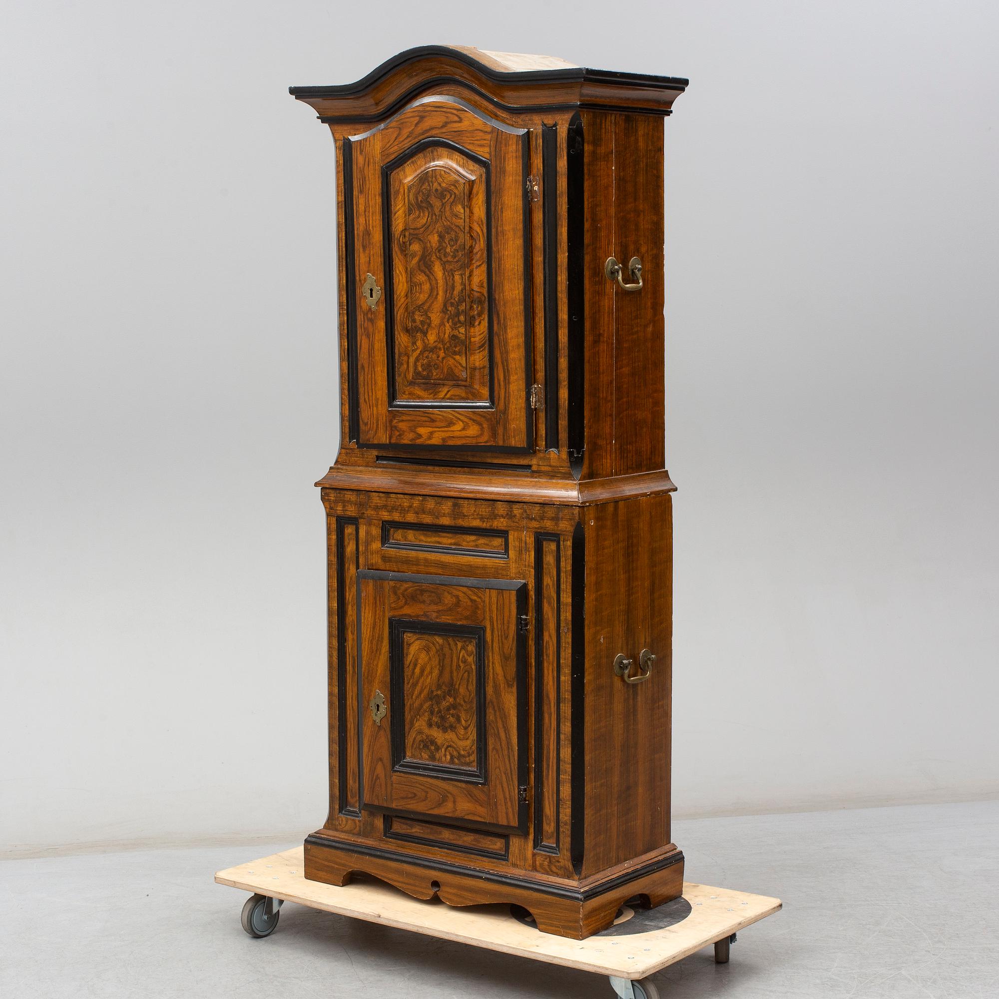 A mid 18th Century painted cabinet.