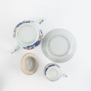 A Chinese imari export porcelain teapot and five cups with saucers, Qing dynasty, Qianlong  (1736-95).