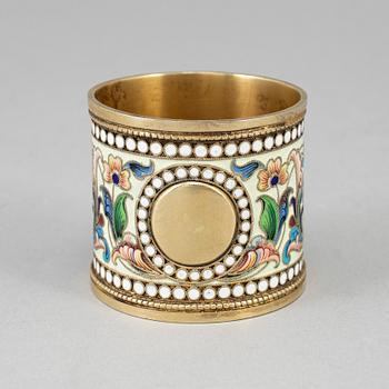 A Russian silver-gilt and cloisonné enamel napkin ring, unidentified makers mark, Moscow 1899-1908.