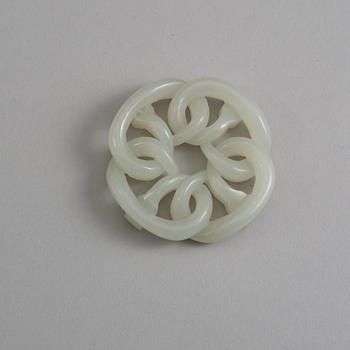 A carved Chinese nephrite pendant.