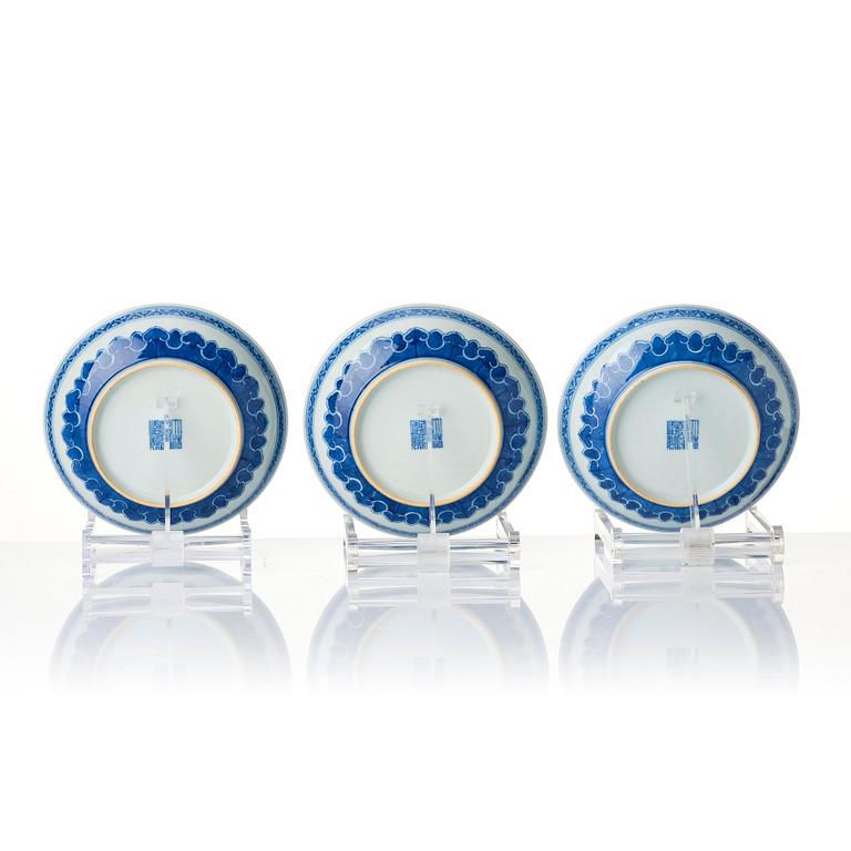 A set of three blue and white dishes, Qing dynasty with Qianlong seal mark.