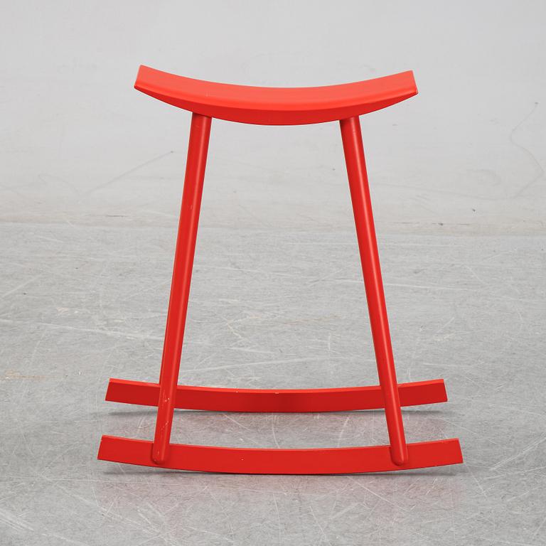Per Sundstedt, a wood rocking stool from Pyra, Sweden.