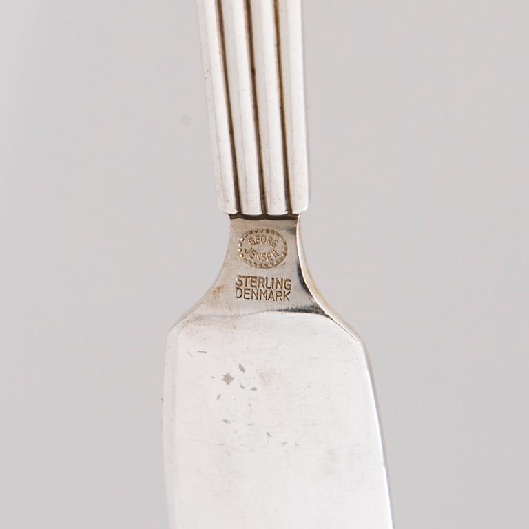 A 106 PIECE SILVER 'Bernadotte' cutlery set for George Jensen Denmark 1945-1977.