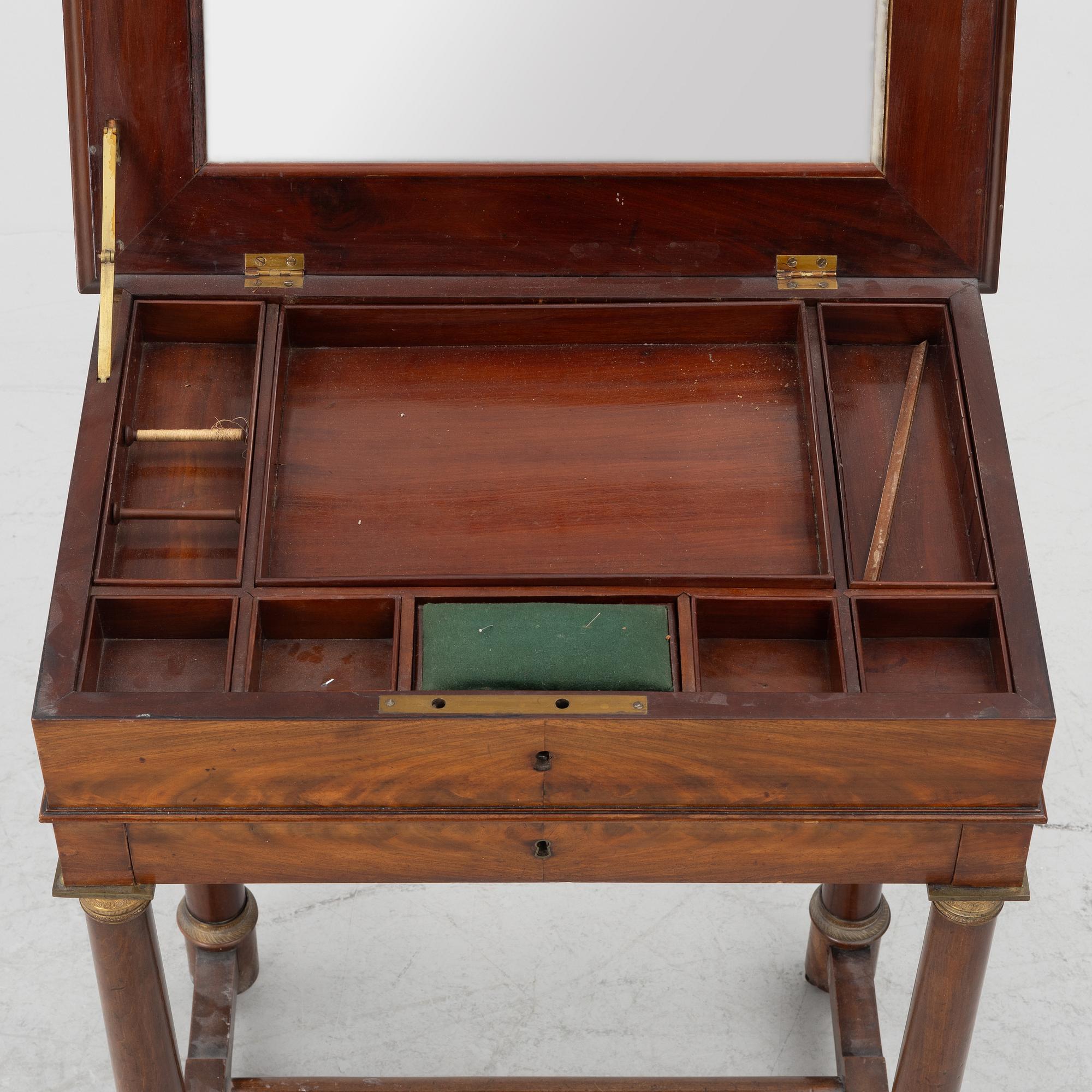 A French Empire mahogany sewing table, first part 19th century.