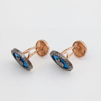 A pair of diamond and enamelled cufflinks. Total carat weight of diamonds circa 0.40 ct.
