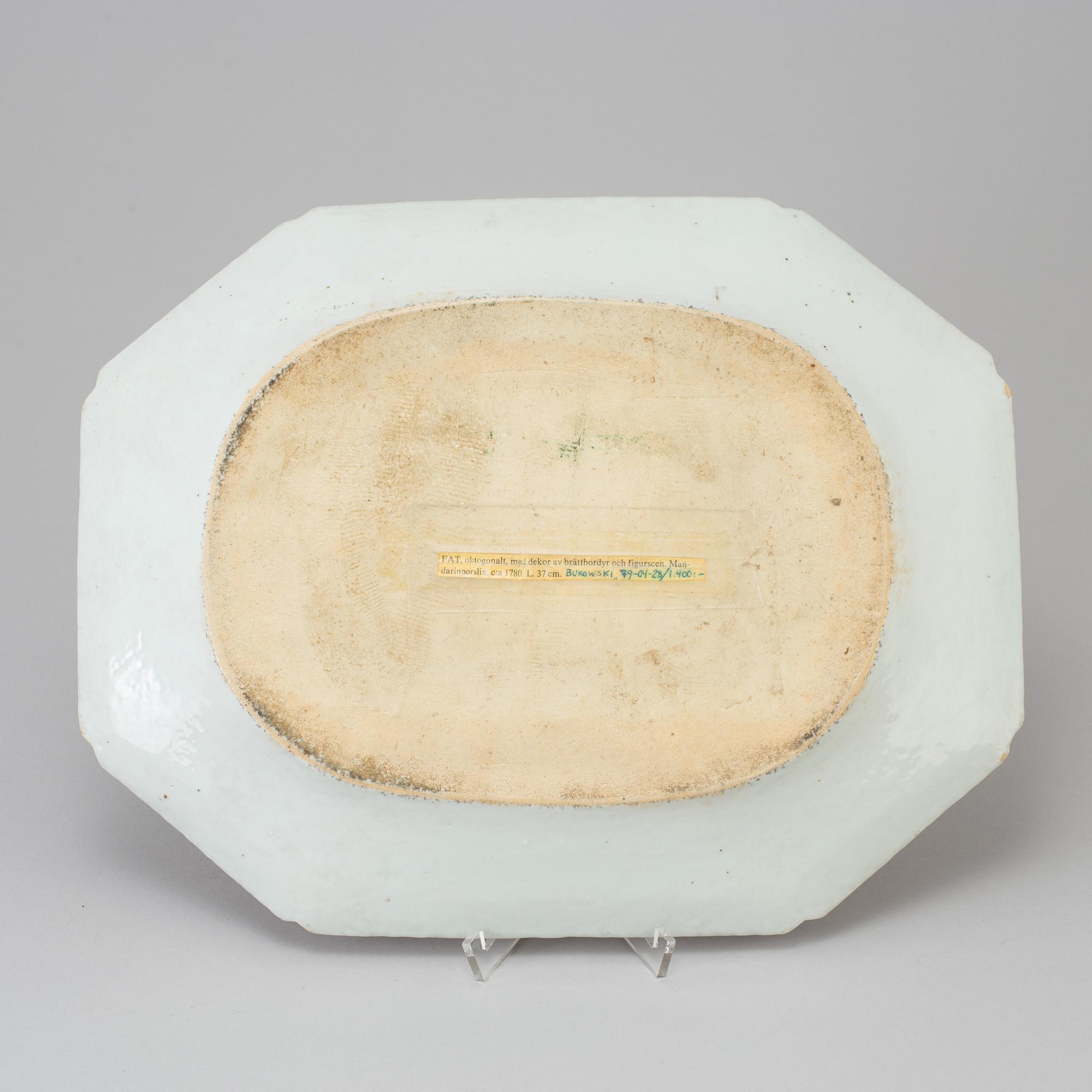 A figural familler rose serving dish, Qing dynasty, Qianlong (1736-95).