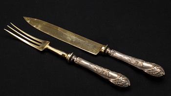 TRANCHERBESTICK, ett par, silver 800, Tyskland. Omkring 1900.
