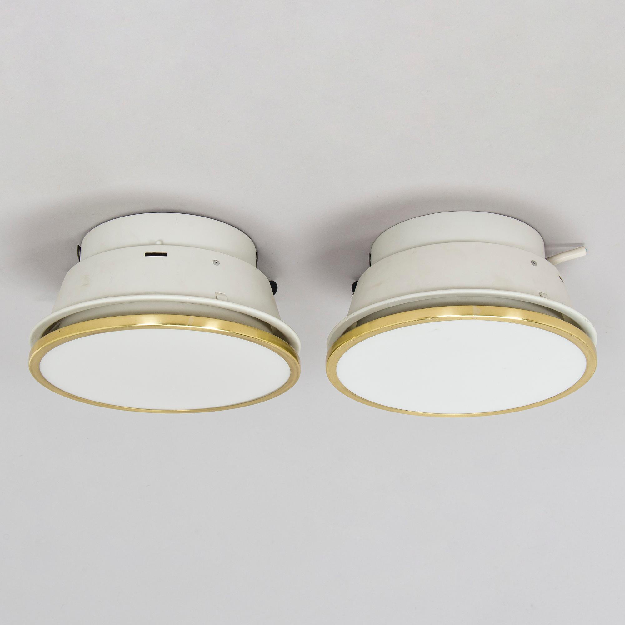 Arne Jacobsen, A pair of 'Munkegaard' ceiling lights for Louis Poulsen, Denmark.