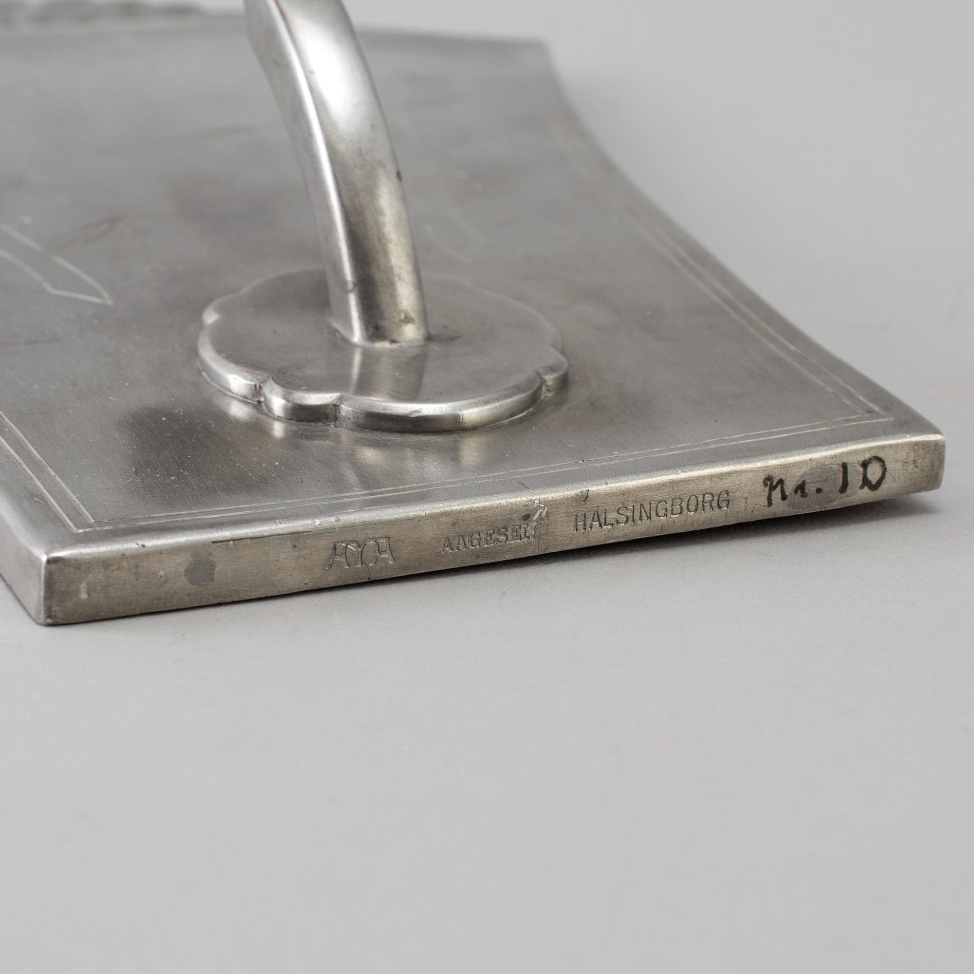 A couple of Wall sconcesof  tin, Astrid M Aagesen, Helsingborg 1920th.