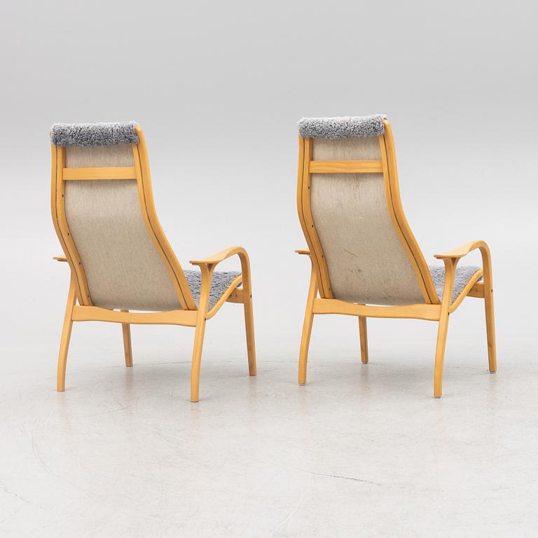 Yngve Ekström, a pair of "Lamino" armchairs for Swedese.