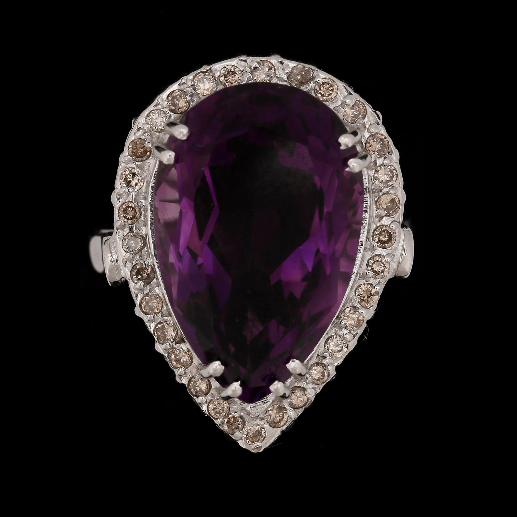 RING, 18k vitguld med ametist och briljantslipade diamanter tot ca0,28ct. 2000-tal. Vikt ca 12,4 gram.